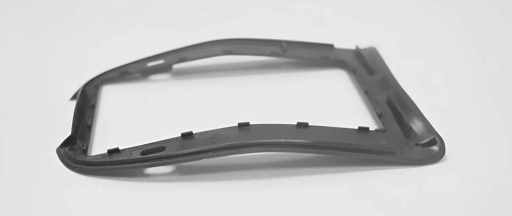 plastic part warpage defect caused by uneven cooling in injection molding