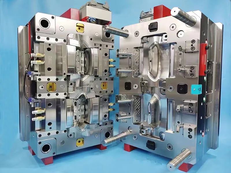 Open custom injection mold showing core and cavity